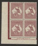 1935 Australia  SG.212 2/- maroon block of 4 (mounted in margin only)