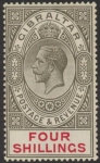 1924 Gibraltar SG.100  4/- black & carmine. watermark multi script CA. M/M