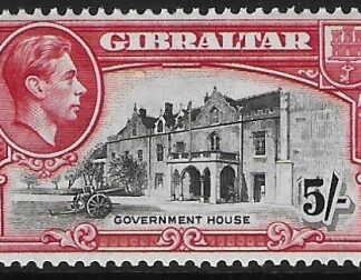 1944 Gibraltar  SG.129b   5/-  black and carmine  perf 13  U/M (MNH)