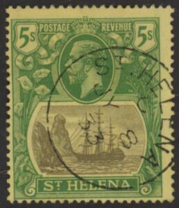 1927 St.Helena SG.110 KGV 5/- grey & green/yellow (wmk. script). very fine used.